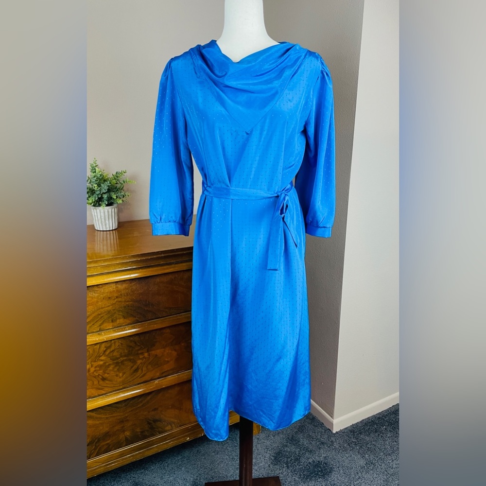 Vintage royal blue midi dress features a distinctive cowl neck and a tie waist